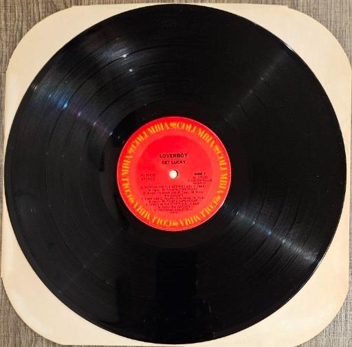 Loverboy 'Get Lucky' Vinyl Record - Autographed Classic Rock Collectible