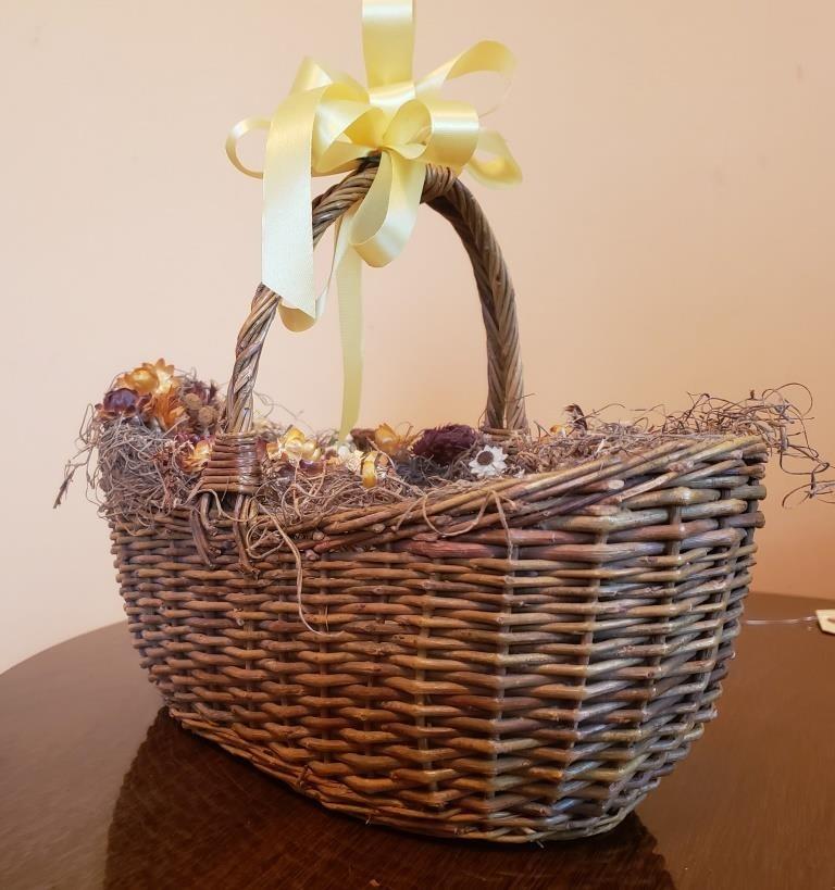 Decorative Wicker Basket with Floral Accents and Yellow Ribbon - Elegant Home Decor