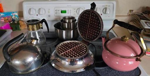 Vintage Kitchenware Collection: Elegant Teapots and Waffle Maker