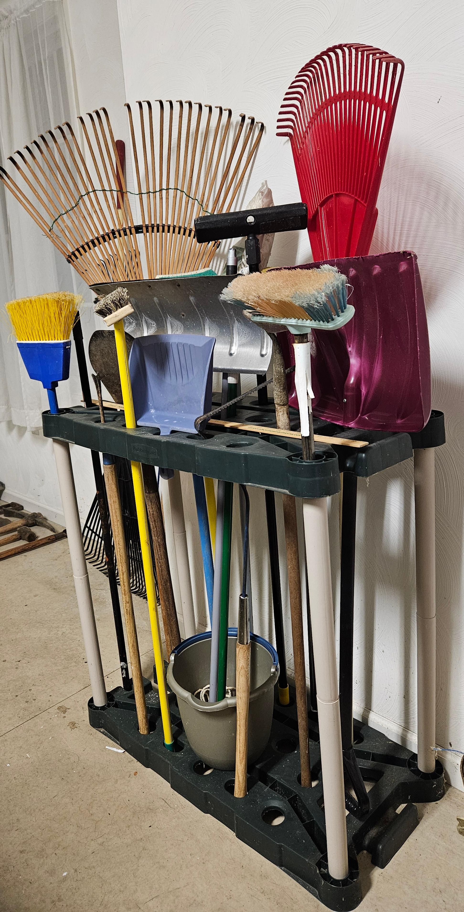 Assorted Cleaning Tools and Rakes