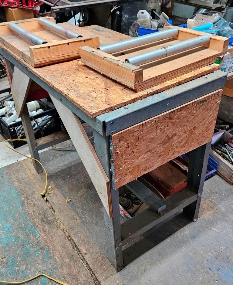 Versatile Steel Table with Rotating Rollers for Woodworking